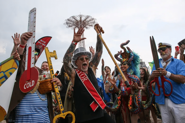 dick zigun with a mayor sash