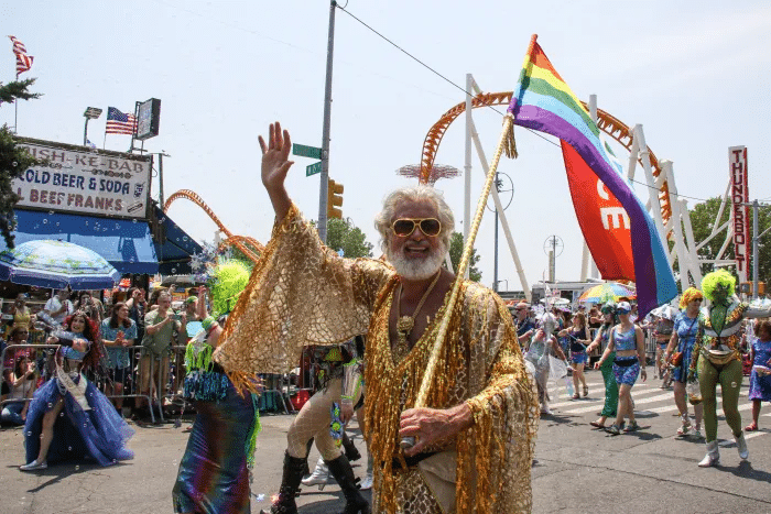 costumed marchers waving