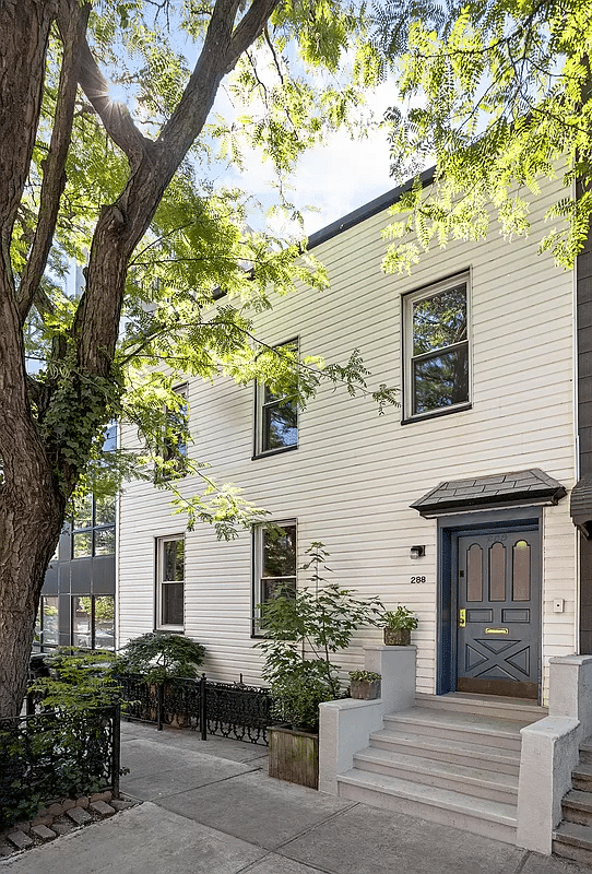 exterior of the house with white siding