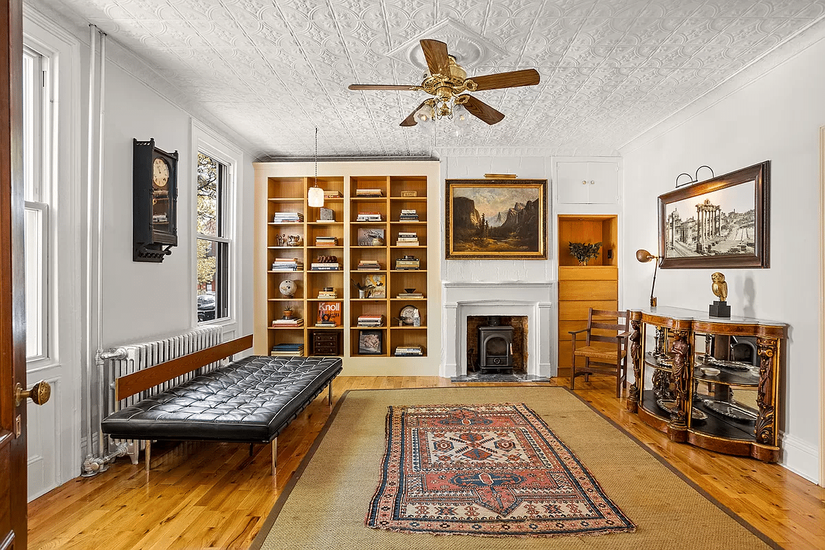 east williamsburg - parlor with tin ceiling, mantel and wood floors