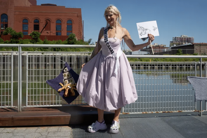 miss gowanus wearing a dress and sash