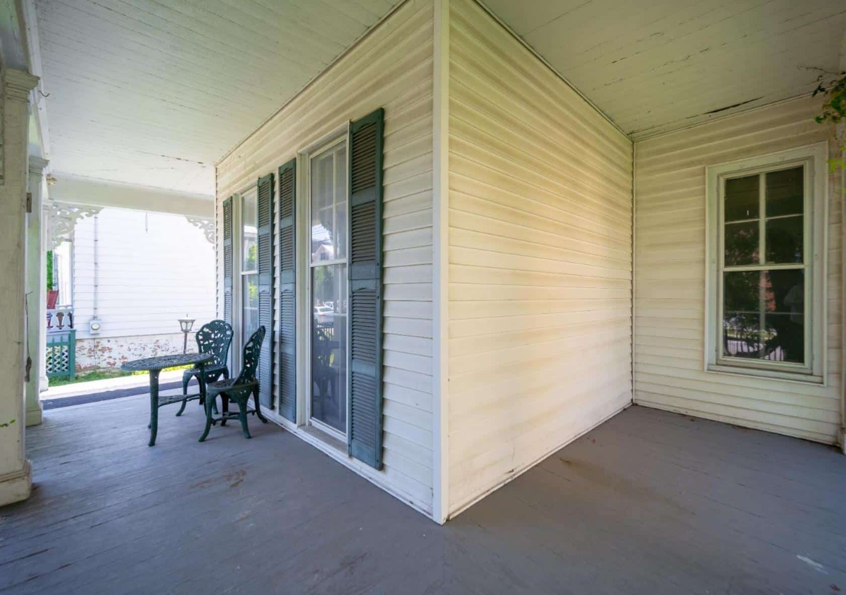 front porch with room for chairs and dining