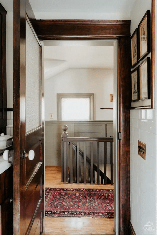 view from bathroom into stair hall