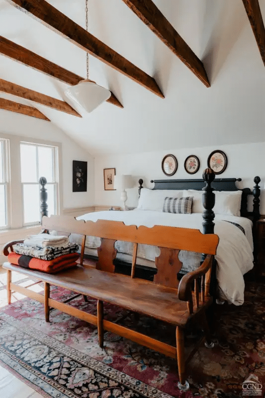 bedroom with horizontal wainscoting