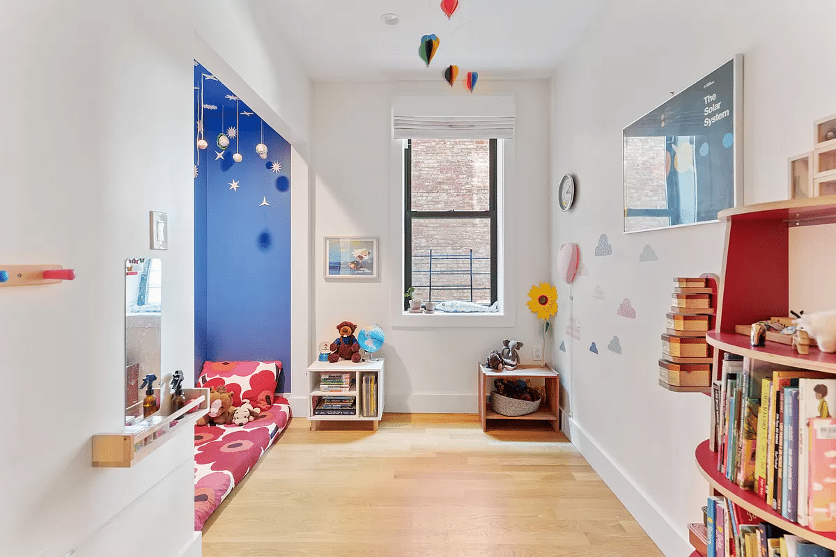 bedroom with wood floor, one window