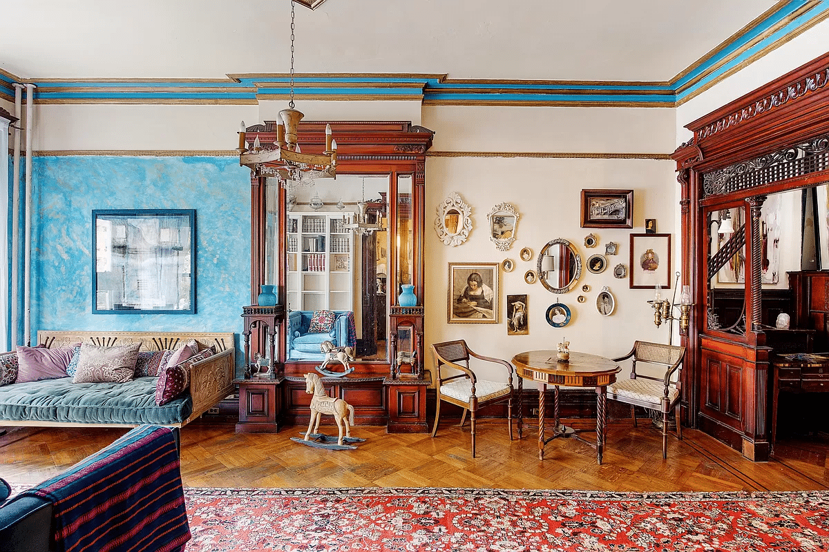 parlor with mirror, fretwork, picture rails