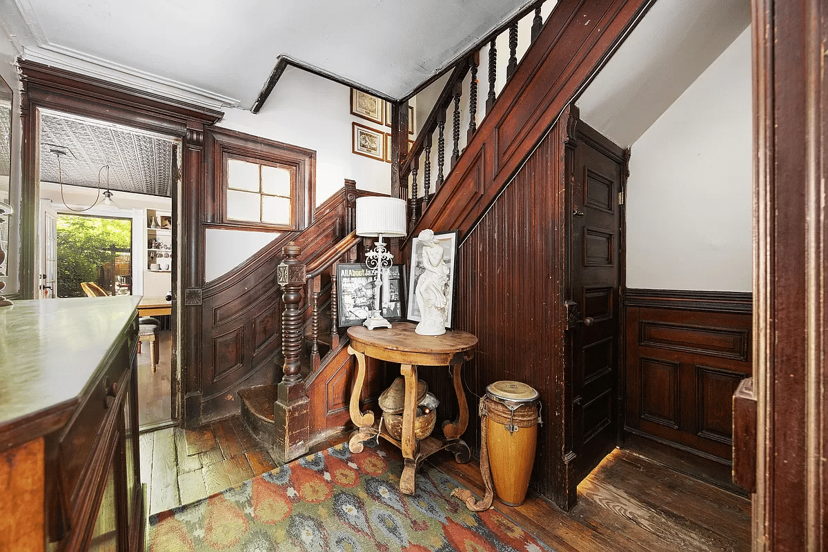 garden level stair hall with wainscoting