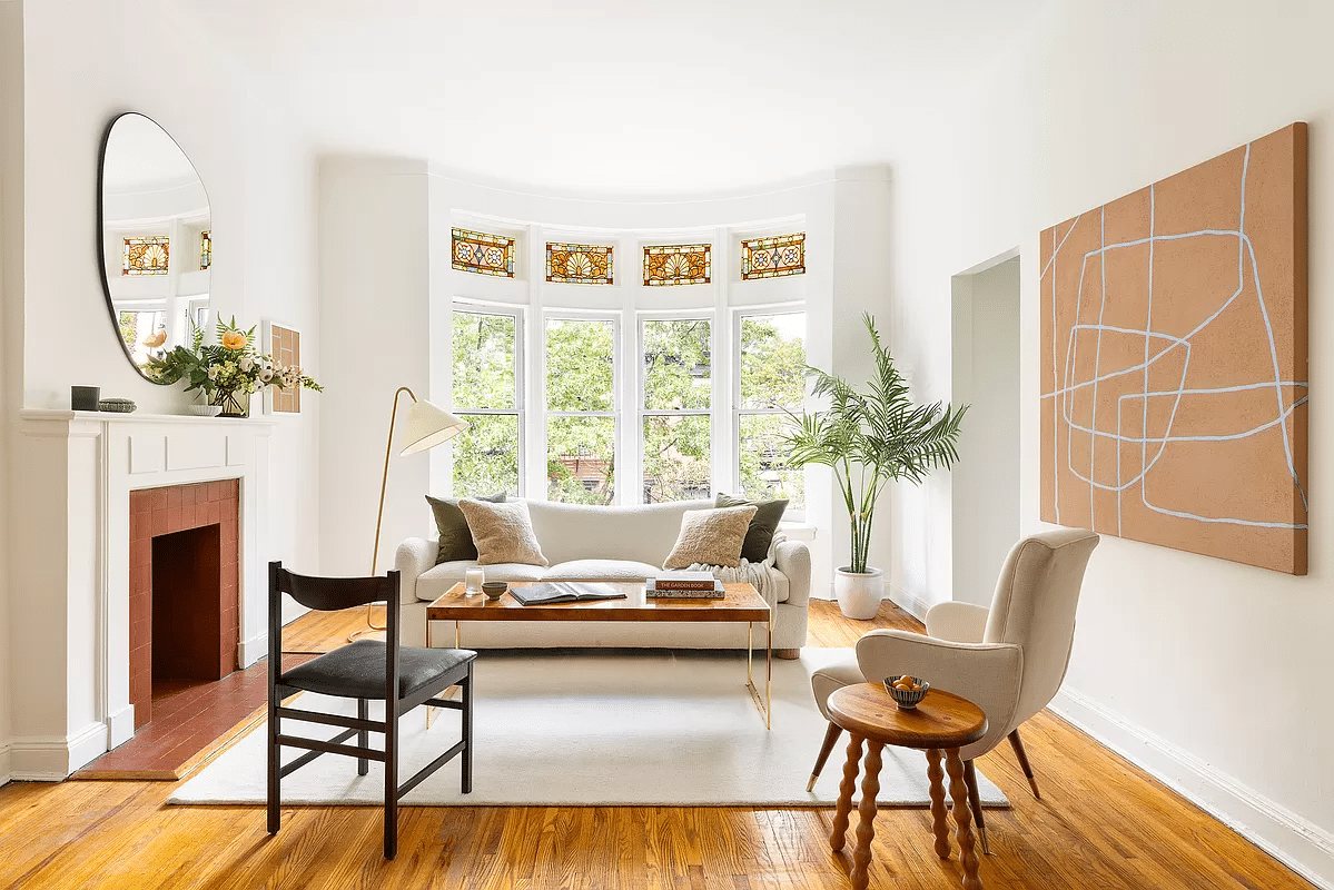 brooklyn heights - living room with stained glass and a mantel