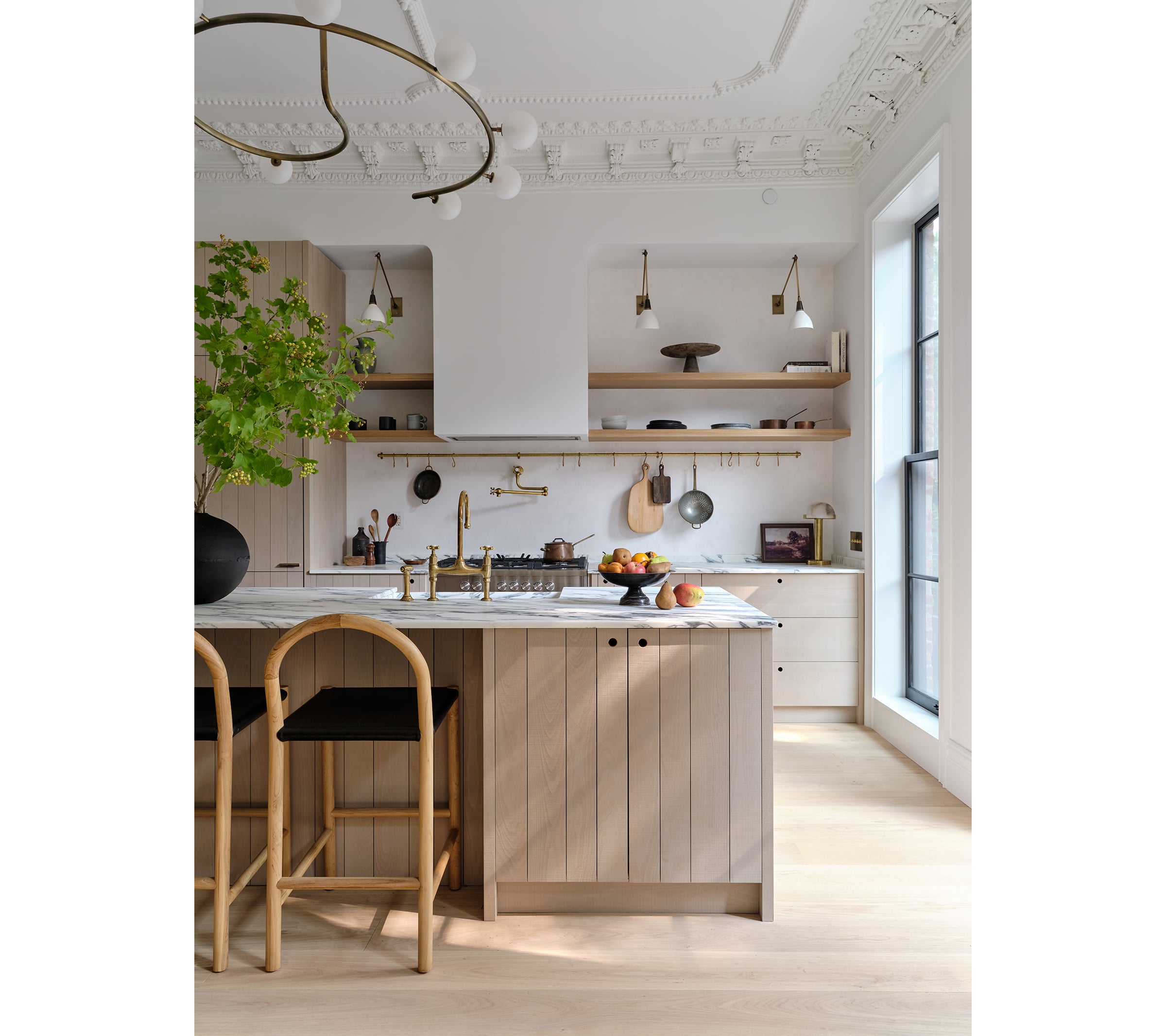 Elaborate ceiling plasterwork crowns a modern Fort Greene kitchen