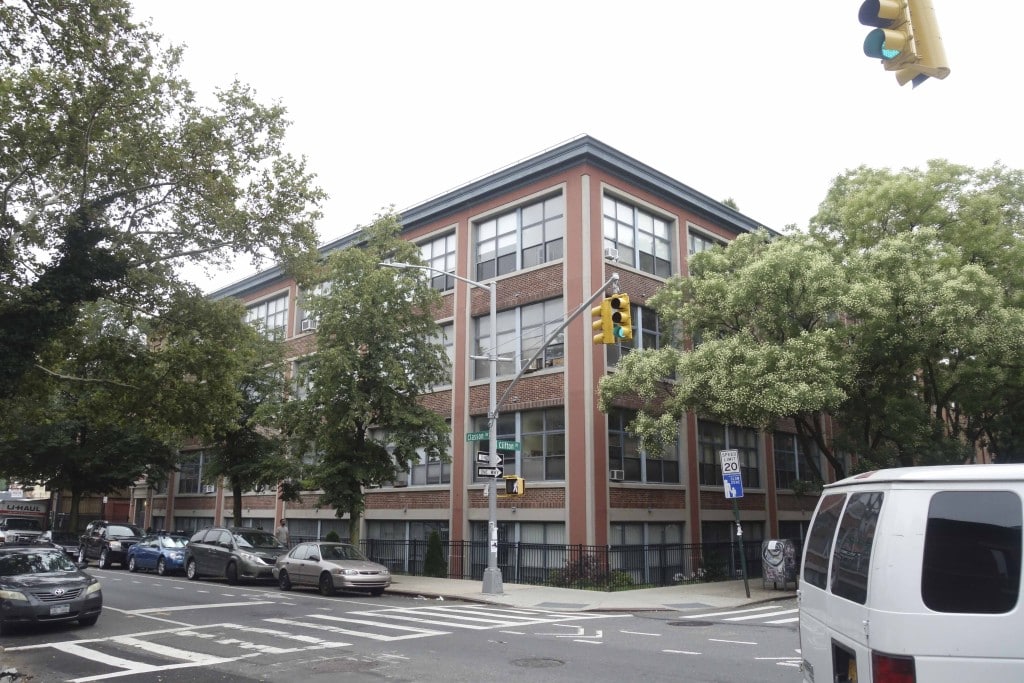 Brick exterior of a four-story building