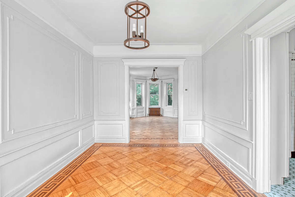 dining room with view into front parlor