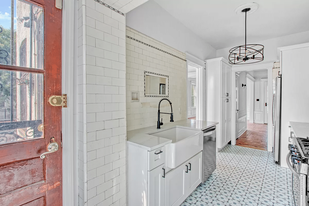 kitchen with period subway tile on walls with border tile,