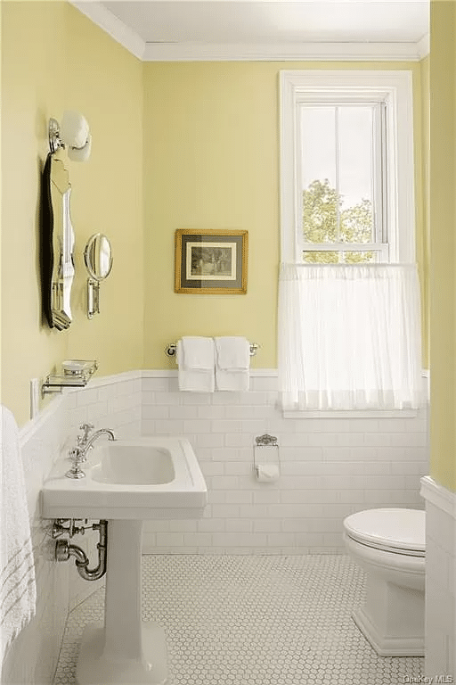 bathroom with white floor ad wall tile