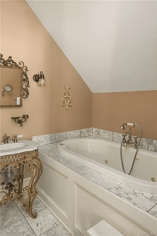 bathroom with soaking tub