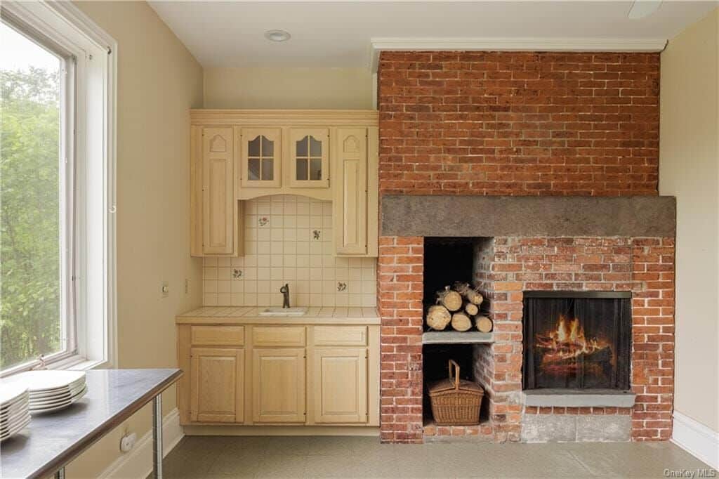 brick fireplace surround in kitchen