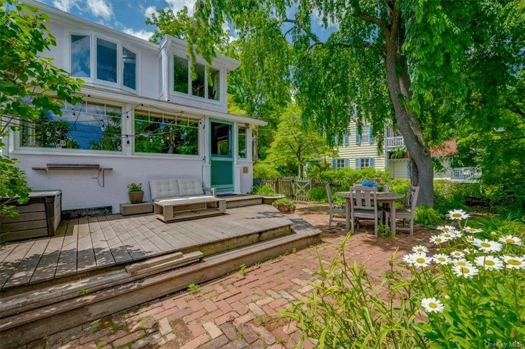 rear facade with wood deck