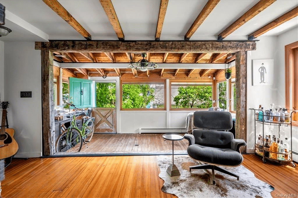 timber framed opening between entry porch and living room