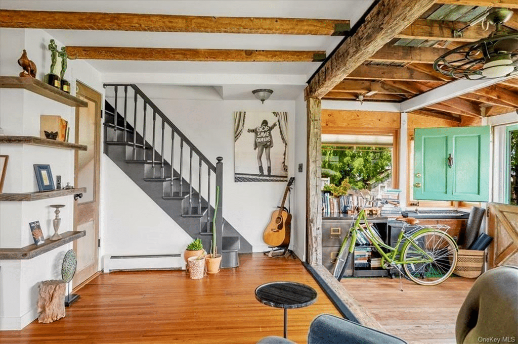 view of dutch door at entry and the stair to the upstairs