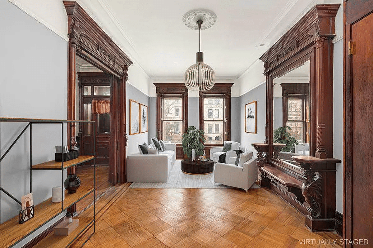 virtually staged parlor with seating area