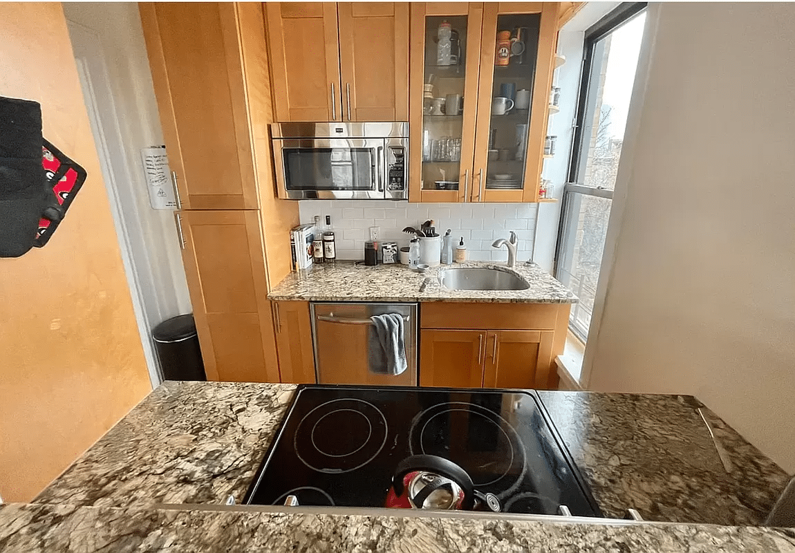 kitchen with dishwasher, electric stove