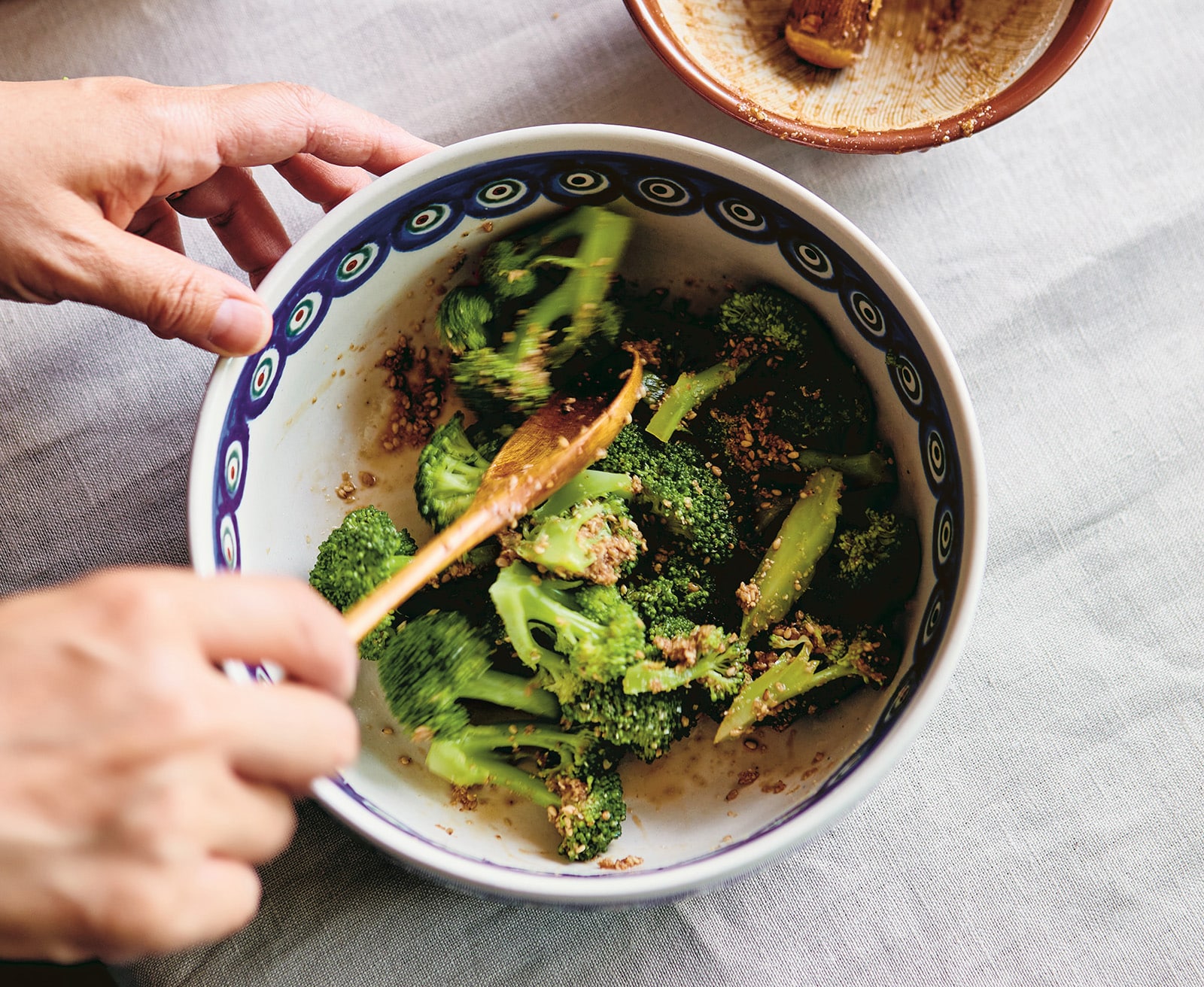 shalom japan - broccoli dish being prepared