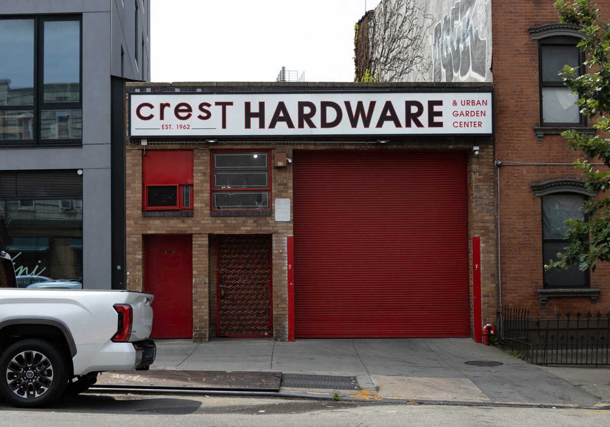 garage with crest hardware sign