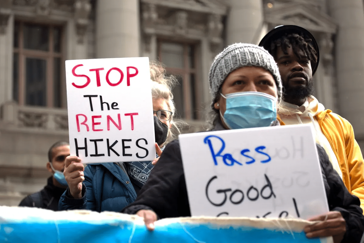 people holding signs