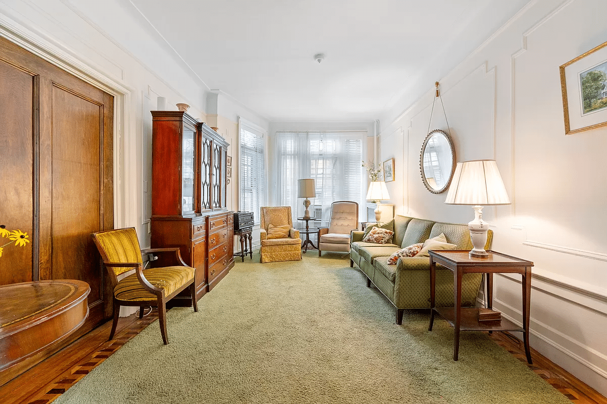 Bay Ridge – Living room with wall moldings, wooden floor, picture moldings