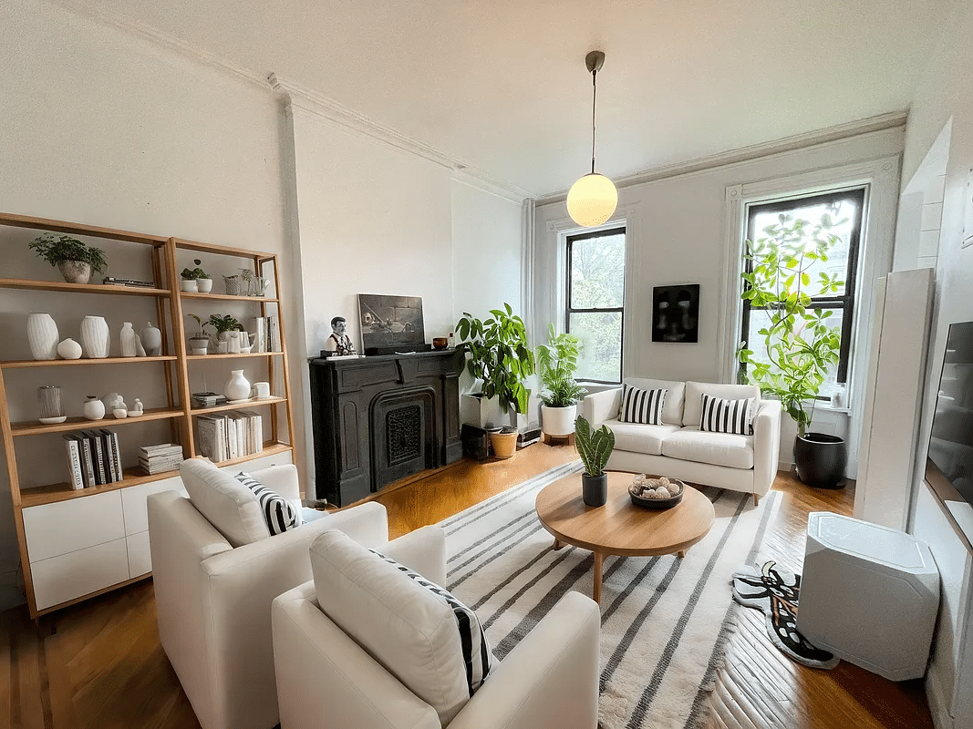 virtually staged living room with loveseat and chairs