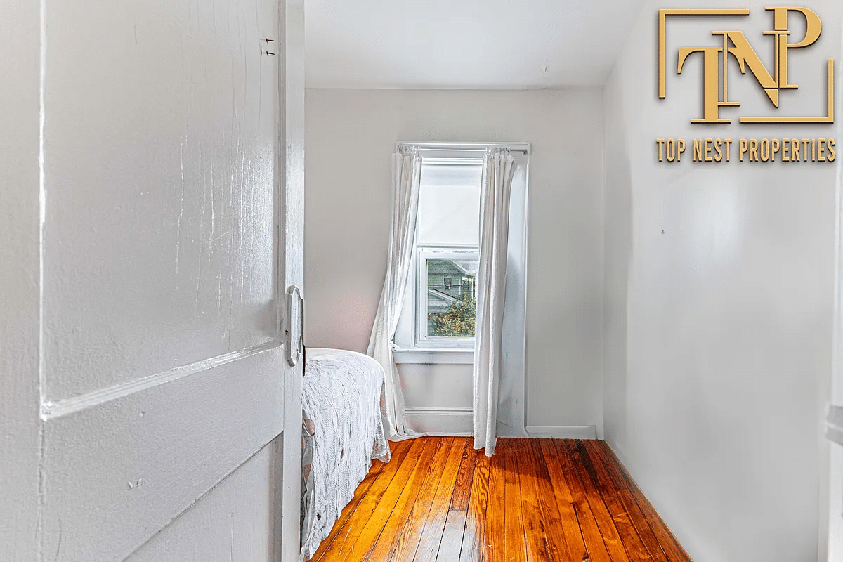 bedroom with wood floor