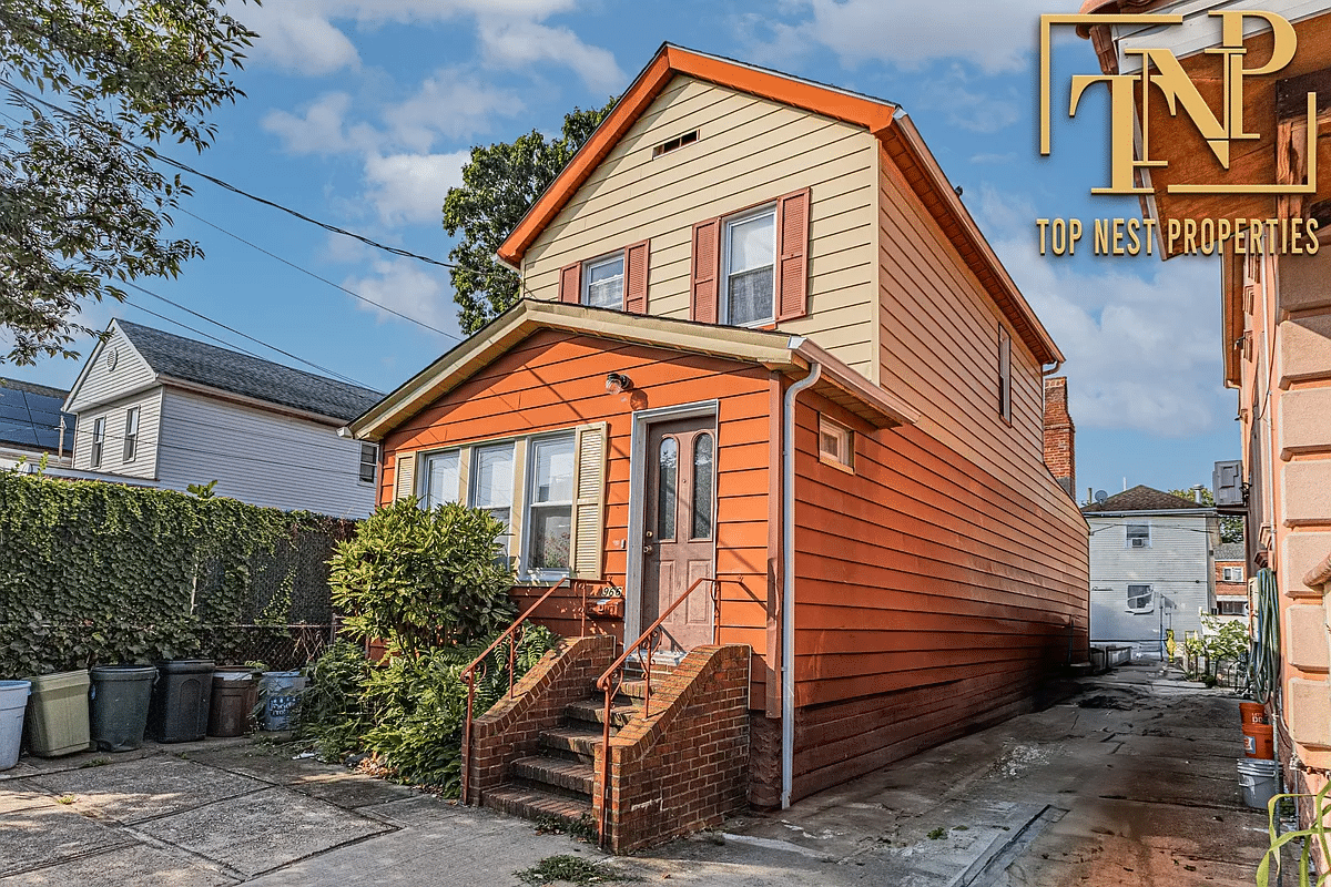 orange and yellow exterior with enclosed veranda