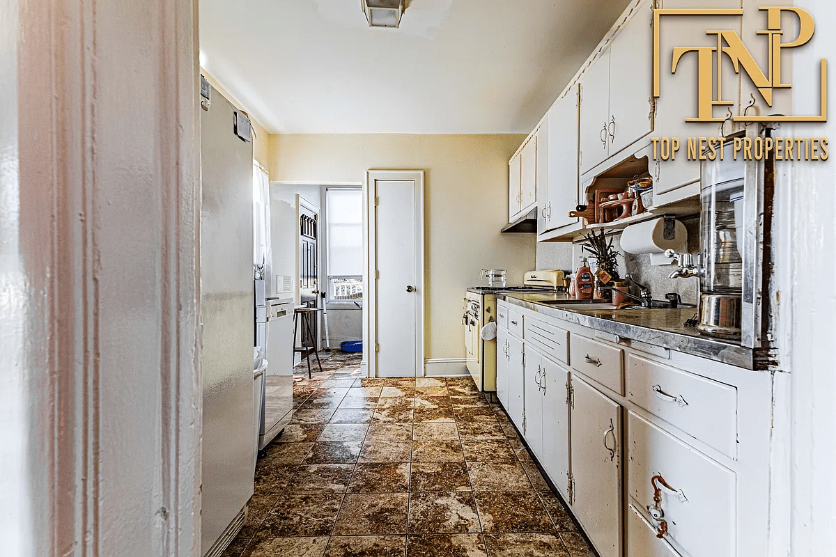 kitchen with original white painted cabinets