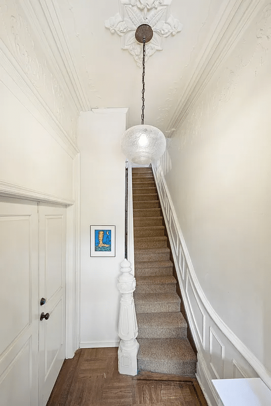 Entrance with stairs, ceiling medallion