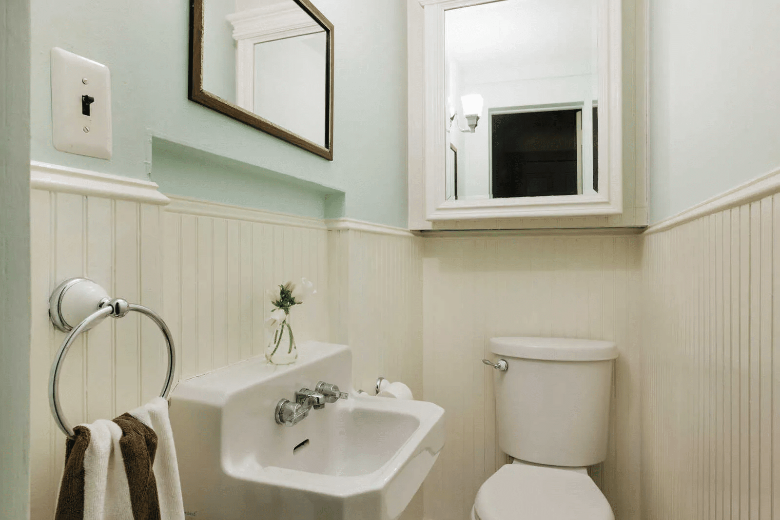 bathroom with beadboard wainscoting