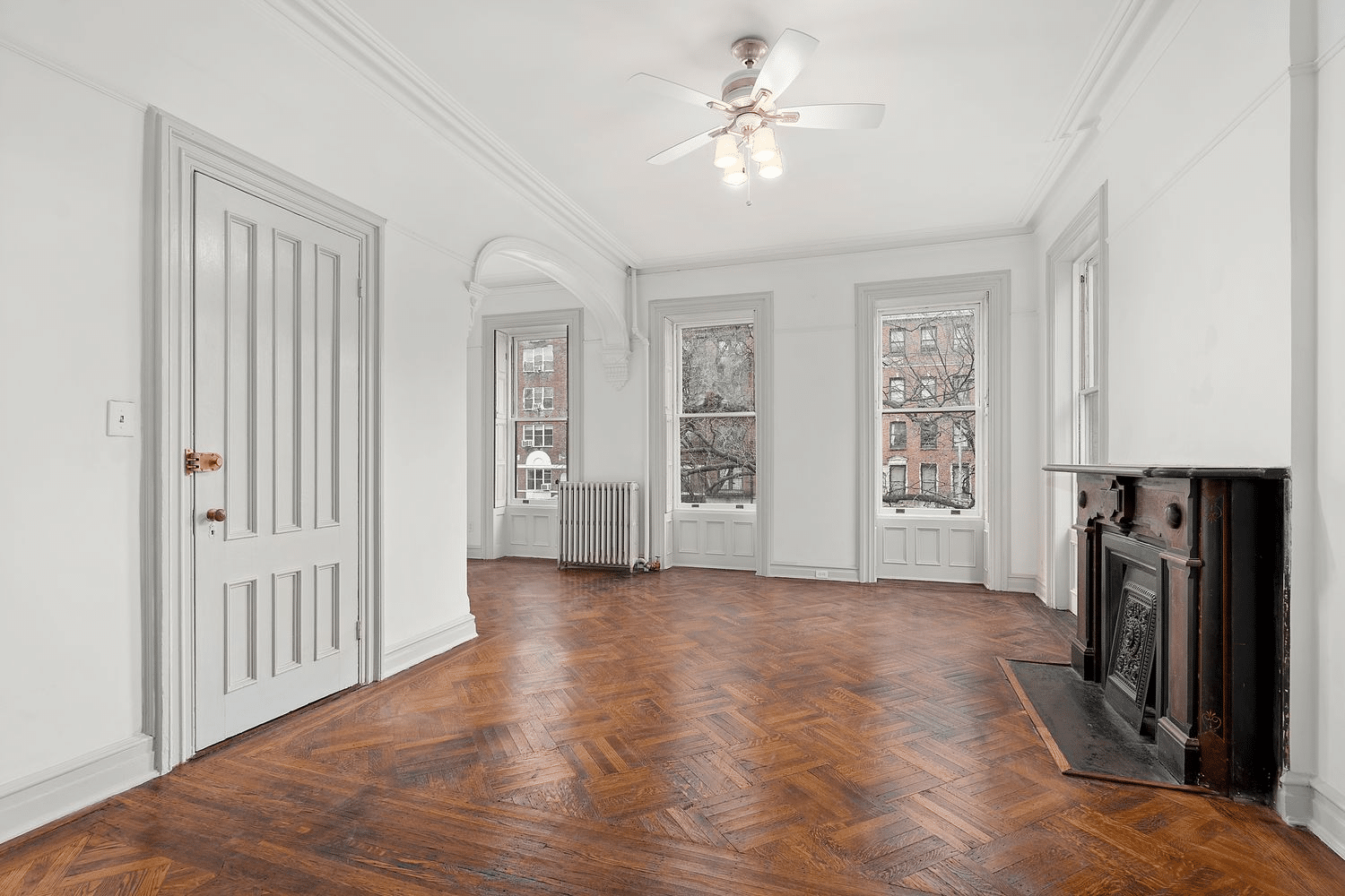 bedroom with mantel, bed niche