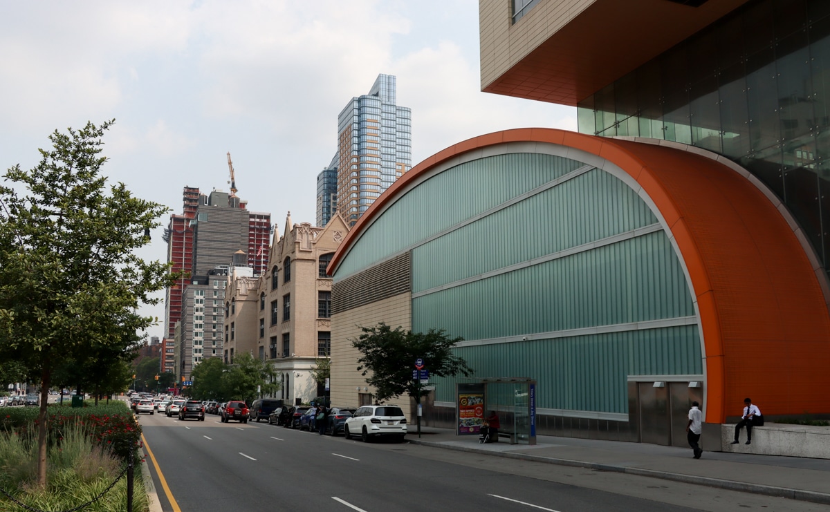 brooklyn- traffic and buildings on tillary street including the orange curve of the City Tech building