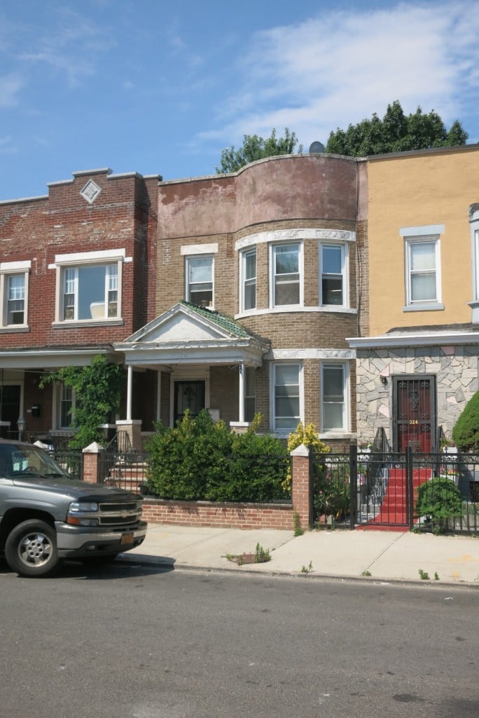 brick, bow front row house