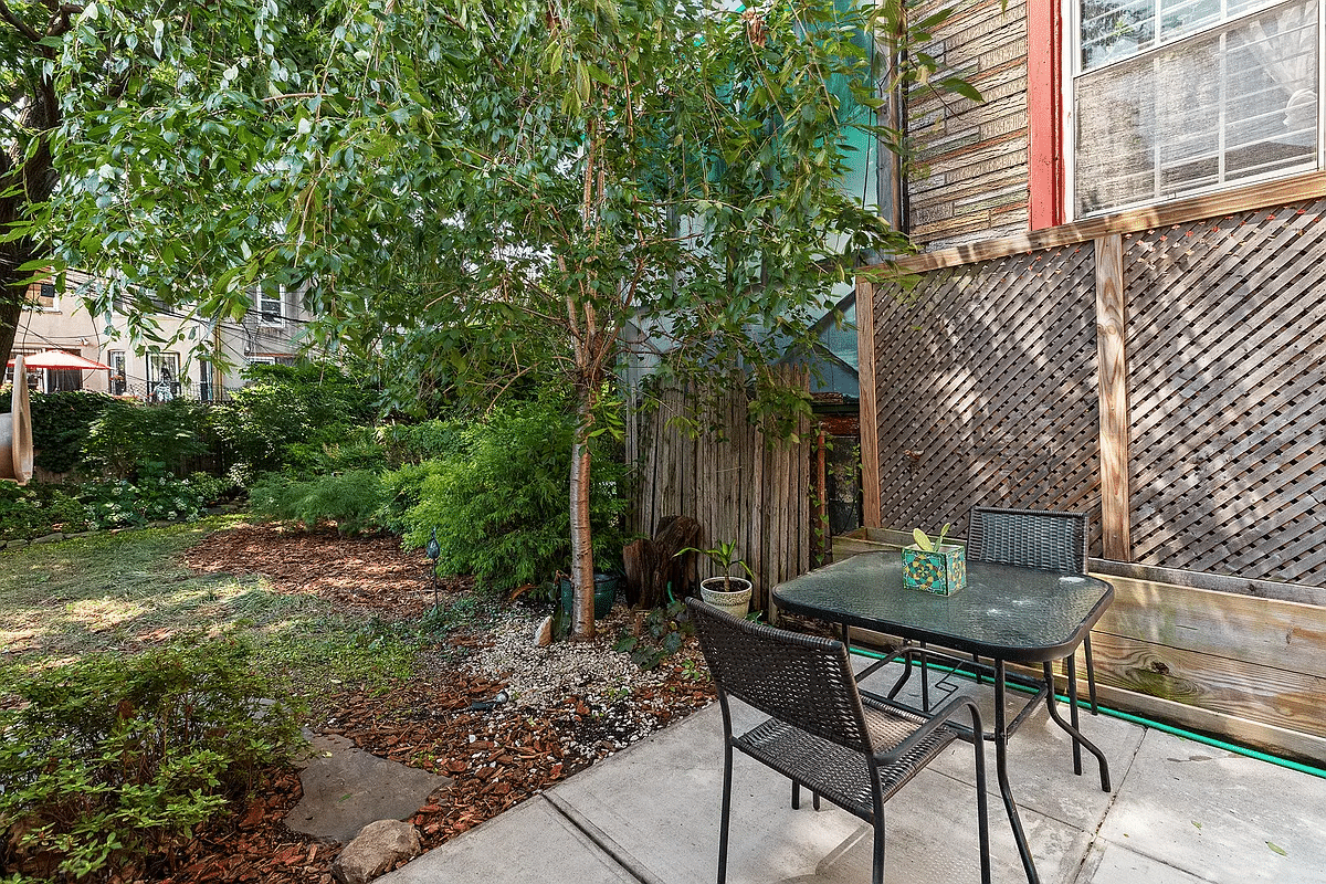 rear yard with a paved patio