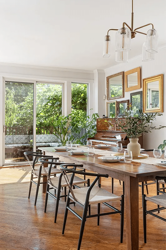 Dining room with glass doors to the backyard