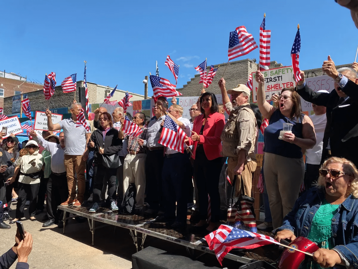 brooklyn - group holding american flags and protest signs