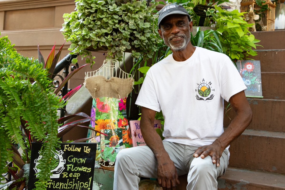 man sitting on his stoop