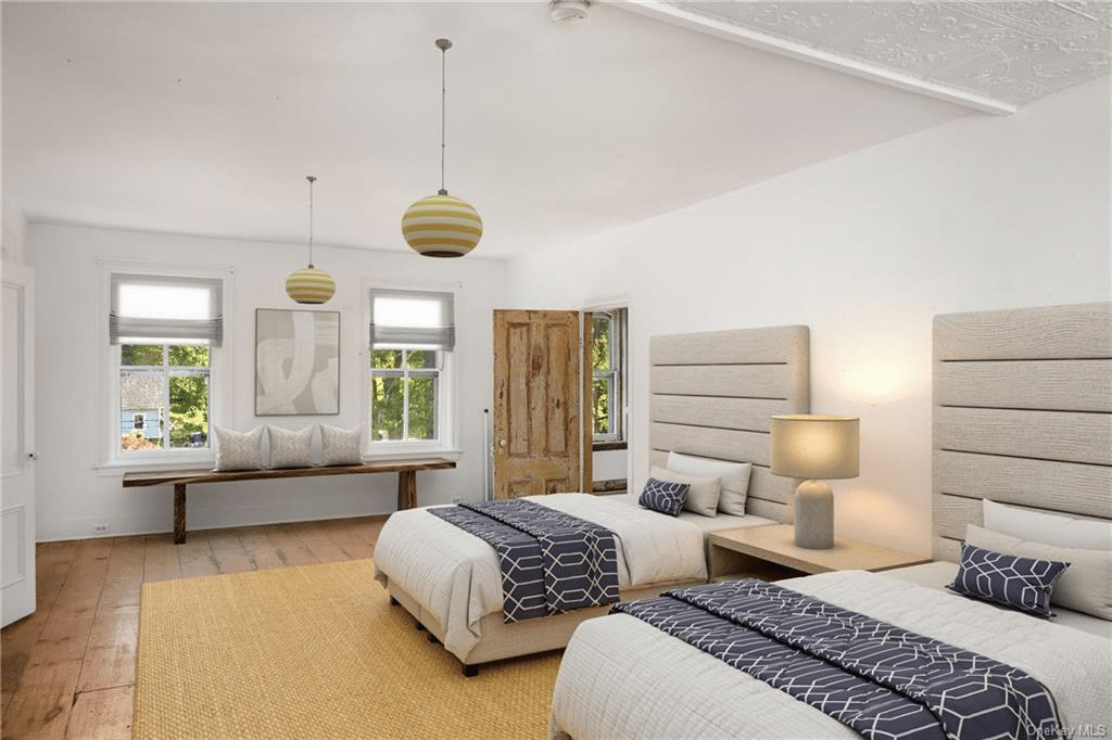 bedroom with wide planked floor boards