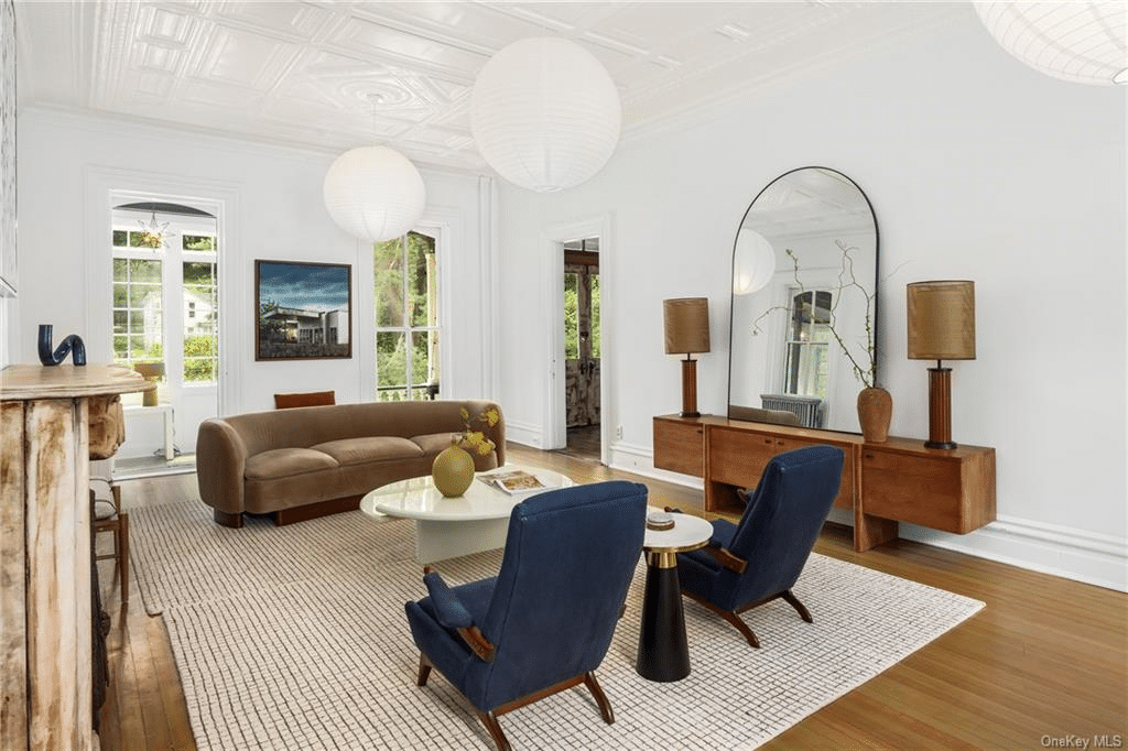 parlor with high ceiling, wood floors