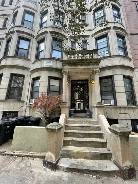 limestone exterior of the flats building