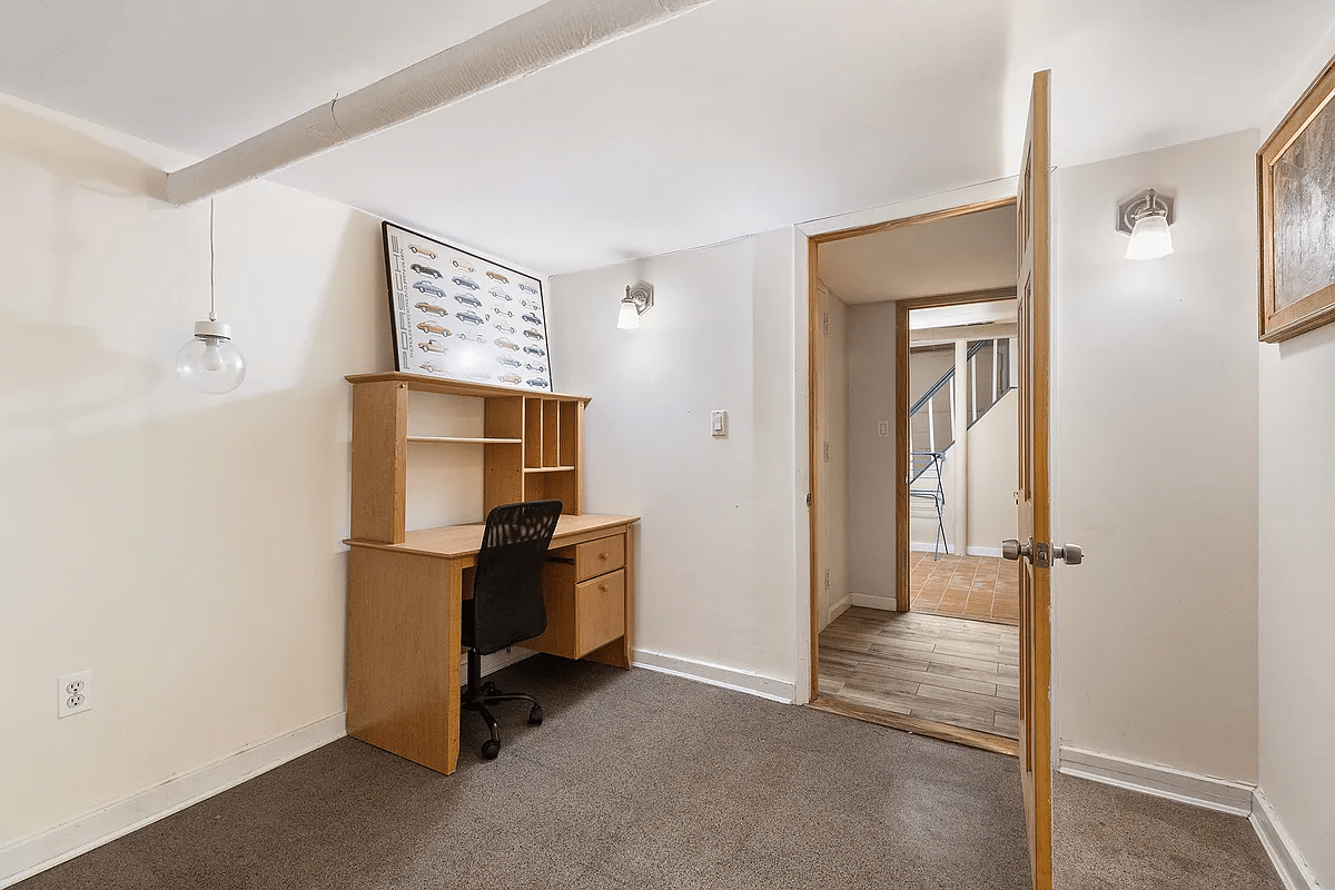 basement office space with carpet