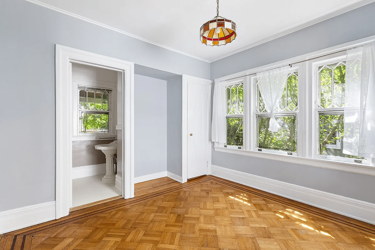 bedroom with en suite powder room