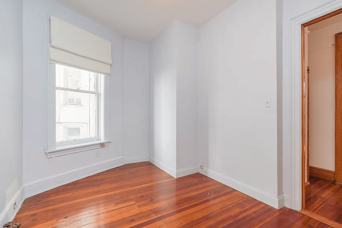 bedroom with wood floor