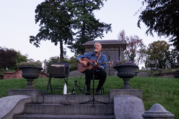 George Stass played guitar and sang at the memorial