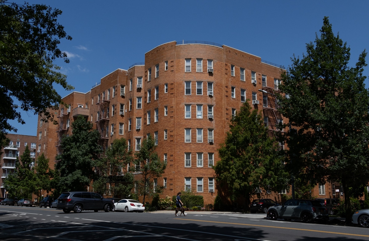 red brick building with curved corner