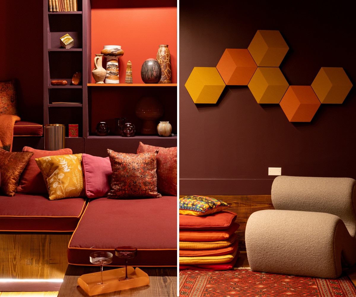 built-in seating and shades of orange, purple and red on the walls